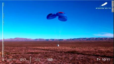 The NS-19 New Shepard capsule parachutes to a landing in December 2021.