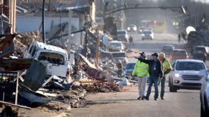 Homes and business are reduced to rubble after a tornado ripped through the area two days prior, on December 12, in Mayfield, Kentucky.