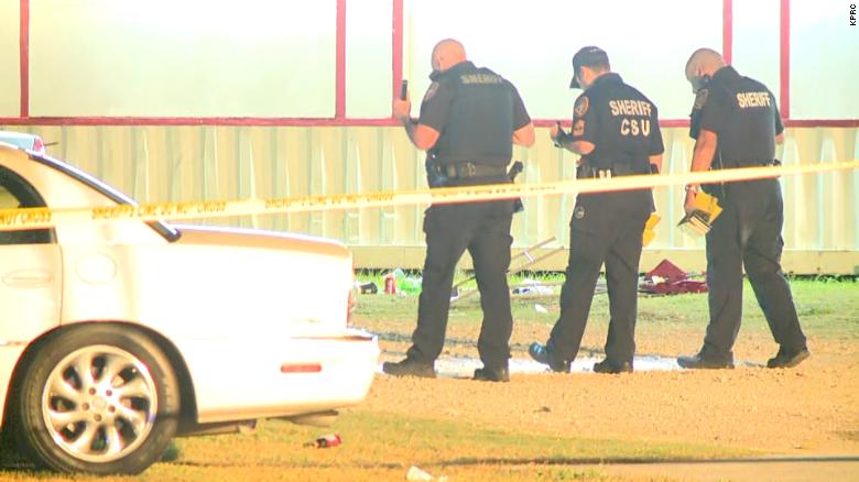 1 person dead and 13 others injured in shooting at a vigil near Houston, police say