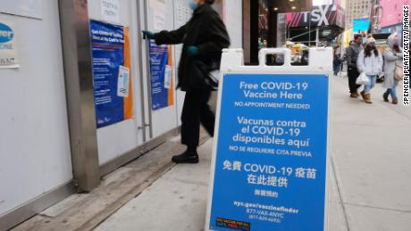 A COVID-19 vaccination pop-up site stands in Times Square on December 09, 2021 in New York City. As the fast-spreading new Omicron variant of COVID-19 has been detected in at least 19 states, health officials are urging Americans to get vaccinated and receive their booster shots.  