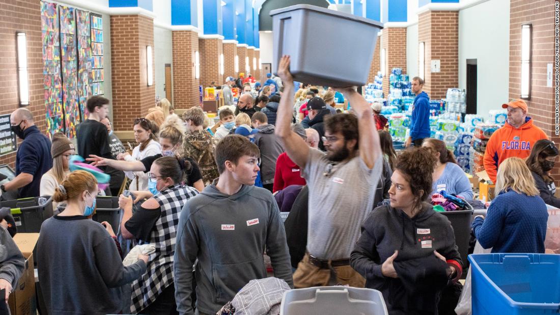 Red Cross volunteers sort donations at South Warren High School in Bowling Green, Kentucky, on December 12 for people affected by tornadoes.