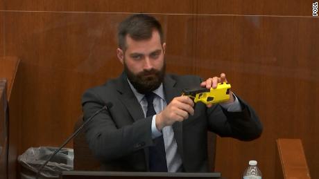 Special agent Sam McGinnis of the Minnesota Bureau of Criminal Apprehension explains the differences between Kim Potter&#39;s service weapon and a Taser.