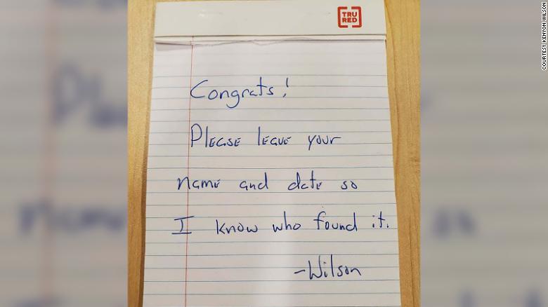 The note Professor Kenyon Wilson left with the cash inside the locker.