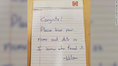 The note Professor Kenyon Wilson left with the cash inside the locker.