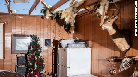 A Christmas tree remains standing in the garage of the Bruces&#39; destroyed home.