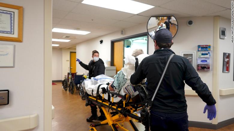 As pandemic fills hospital beds, paramedics spend more time moving patients and less on emergencies