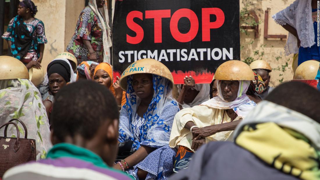 People protest on June 22, 2019 in front of the Ouagadougou courthouse to demand &quot;truth and justice&quot; for the victims of a terrorist attack in Yirgou that left 49 dead.