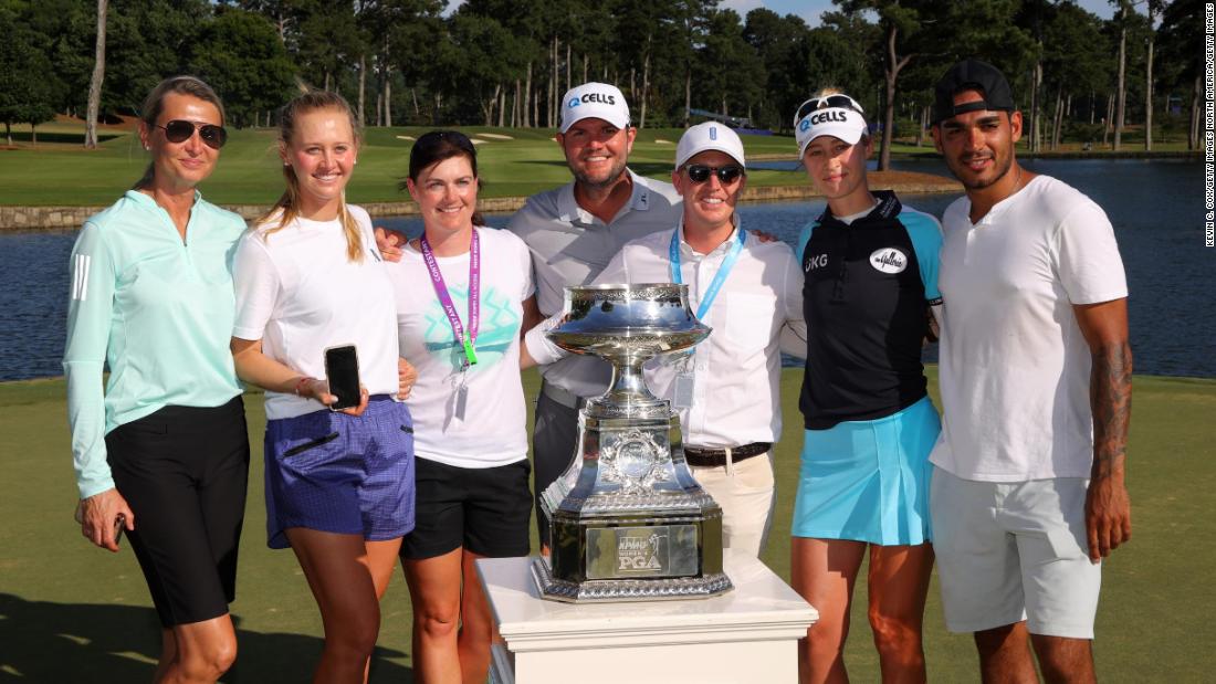 Nelly has enjoyed somewhat of a coming of age year in 2021. As well as winning gold at the Olympics in Tokyo, she won four times on the LPGA Tour this season -- bringing her total victories on the tour to seven -- including her debut major, finishing first at the Women&#39;s PGA Championship in June. She celebrates with her family -- including mother Regina (far left) and Jessica (second left) -- after winning the Women&#39;s PGA Championship.