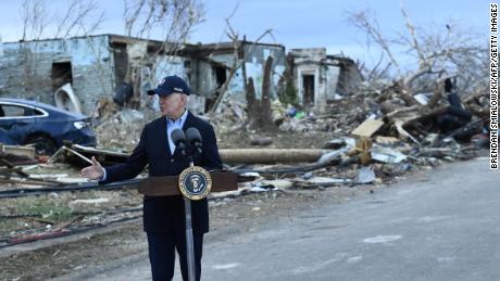 US President Joe Biden speaks after visiting storm damage in Dawson Springs, Kentucky on December 15, 2021.  - Biden will tour areas devastated by Hurricanes December 10-11. 