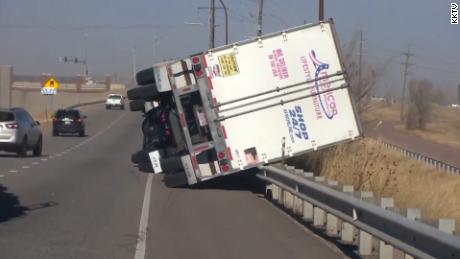 A semi-trailer on Interstate 25 was overturned by high winds in El Paso County, Colorado. 