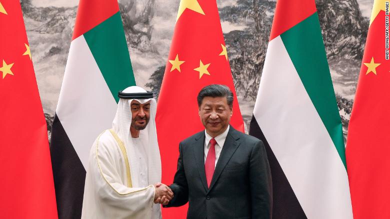 Abu Dhabi&#39;s Crown Prince Mohammed bin Zayed shakes hands with Chinese President Xi Jinping after witnessed a signing ceremony at the Great Hall of the People in Beijing on July 22, 2019. 