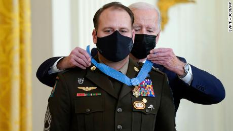President Joe Biden presents the Medal of Honor to Army Master Sgt.  Earl Plumlee for his actions in Afghanistan on August 28, 2013, at an event in the East Room of the White House on Thursday, December 16, 2021, in Washington.  (AP Photo / Evan Vucci)