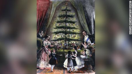 December 1848:  The Royal Christmas tree is admired by Queen Victoria, Prince Albert and their children. 