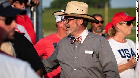 Dr Douglas G. Frank chats with others before former President Donald J. Trump arrives to speak at a rally at the Lorain County Fairgrounds on Saturday June 26, 2021 in Wellington , Ohio.