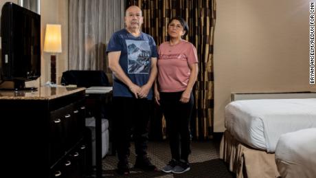 Mario Gamino, left, and Bibiane L. Chamorro are among the people displaced by Hurricane Ida who are now staying at the Radisson Hotel by the JFK Airport in Queens.