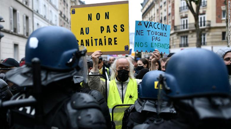 Thousands of people have attended protests in Paris against France&#39;s &quot;Pass Sanitaire&quot; vaccine passport.