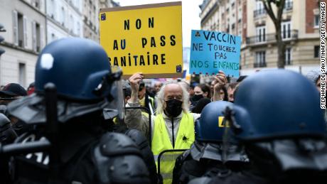 Thousands of people have attended protests in Paris against France&#39;s &quot;Pass Sanitaire&quot; vaccine passport.