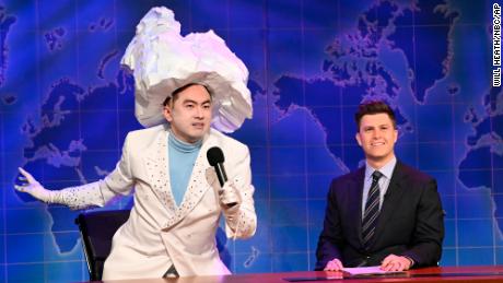 Bowen Yang as the iceberg that sank the Titanic, departed and anchored Colin Jost during Weekend Update on "Saturday Night Live"  in New York on April 10, 2021. 