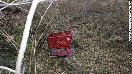 The shopping cart pictured above was located in an isolated wooded area near where human remains were found on Wednesday in the Alexandria section of Fairfax County.