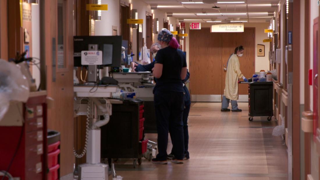 'Round after round of Covid.' Military personnel help a Michigan hospital that's inundated with Covid patients and short on staff