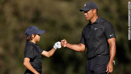 Tiger Woods with his son, Charlie, Friday on the course of the PNC Championship