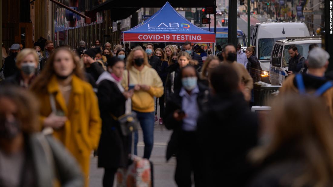 People line up to be tested for Covid-19 at a testing booth in New York December 17.