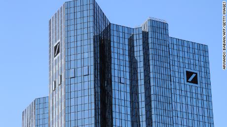 The logo of German giant Deutsche Bank is seen on their headquarters in Frankfurt am Main, western Germany, on February 4, 2021.