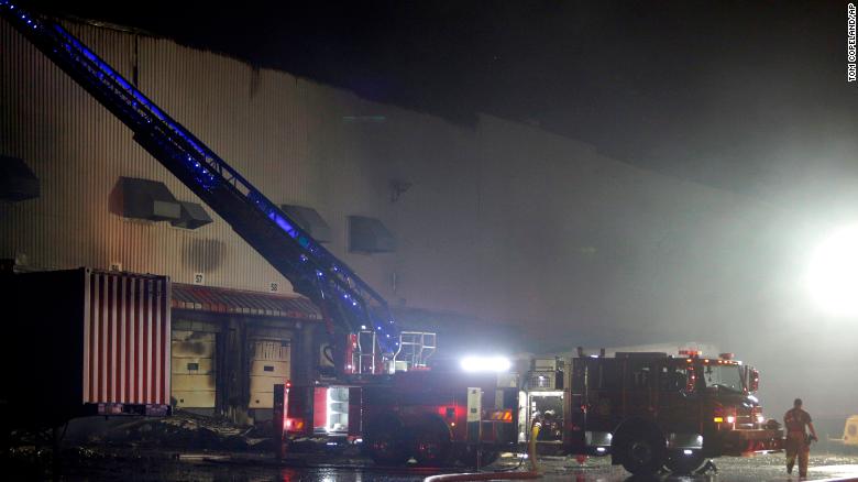 A body was found in a QVC facility that was heavily damaged in a fire