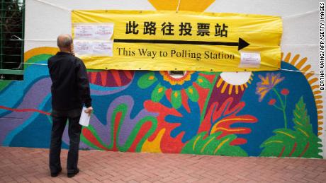 A banner outside a polling station during the December 19 by-elections in Hong Kong.