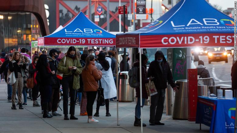 People wait in line for Covid-19 tests in Brooklyn, New York, on December 17, 2021.