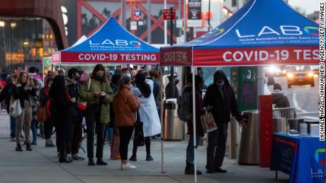 People line up for Covid-19 tests in Brooklyn, New York on December 17, 2021.