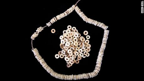 A string of modern ostrich eggshell beads from eastern Africa is shown. 