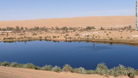 Fernando Espinoza described Gaberoun oasis as &quot;amazing&quot; in text messages to his mother and sent this photo of the lake.