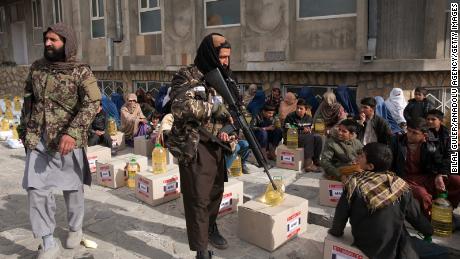 Turkey&#39;s Disaster and Emergency Management Presidency provides food aid to Afghan families in Kabul on December 7.