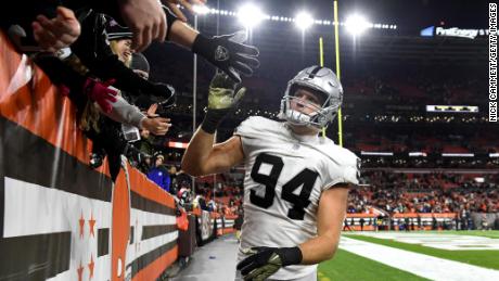 Carl Nassib of the Raiders interacts with fans after defeating the Cleveland Browns.