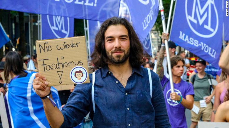 Nicolas Rimoldi at a protest this year. He says his movement, which campaigns against vaccine passports, is &quot;not anti-vax&quot; and that people who have been vaccinated attend its demonstrations.