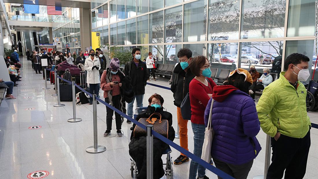 At Boston's Logan Airport, travelers line up for Covid-19 testing on December 20. 