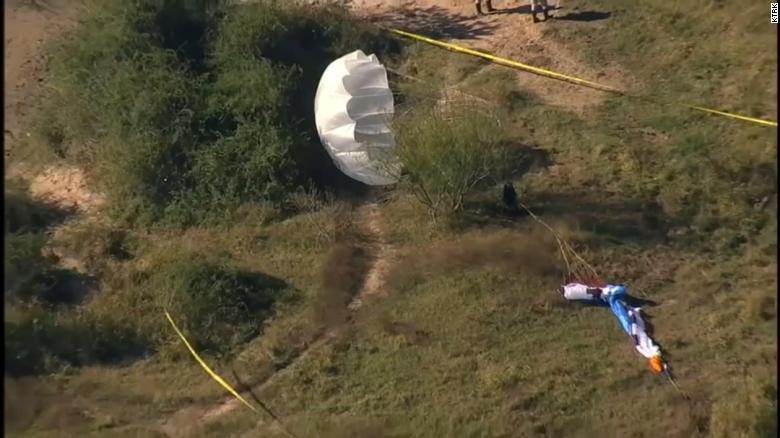 2 dead after small plane and paraglider collide