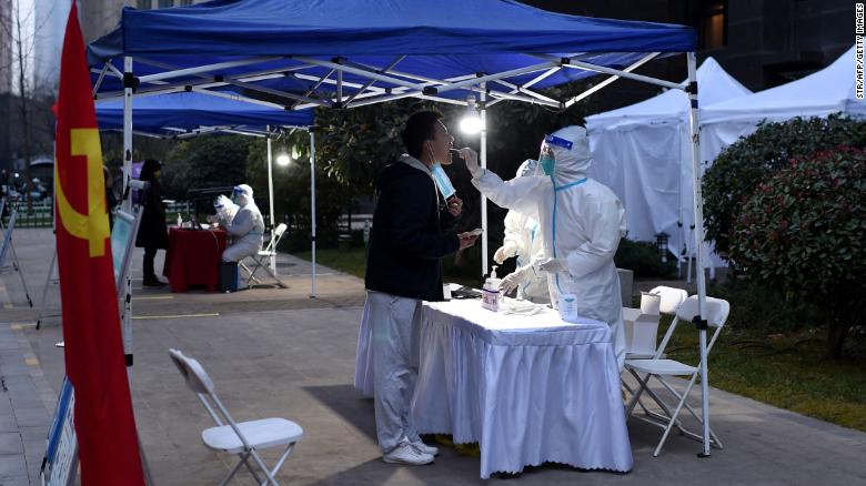 A resident gets tested for Covid-19 in Xi&#39;an, China, on December 23.