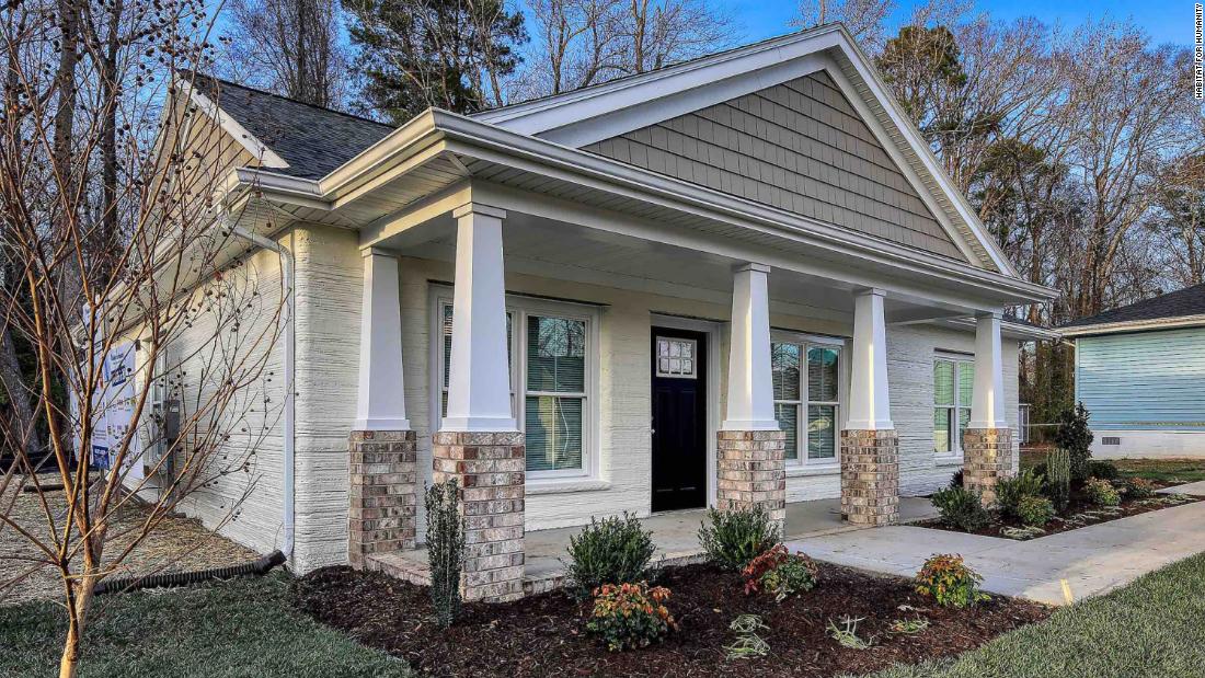 Virginia family gets keys to Habitat for Humanity's first 3D-printed home  in the US