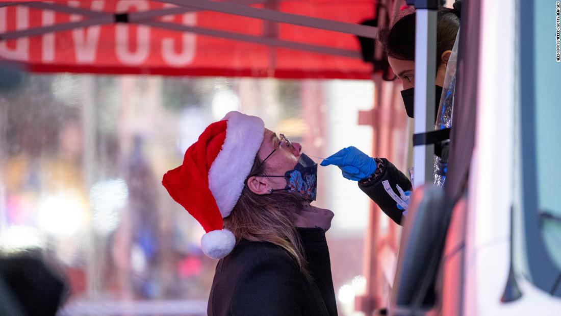 Maia Goodell receives a Covid-19 test in Times Square on Thursday, December 23, in New York City. 