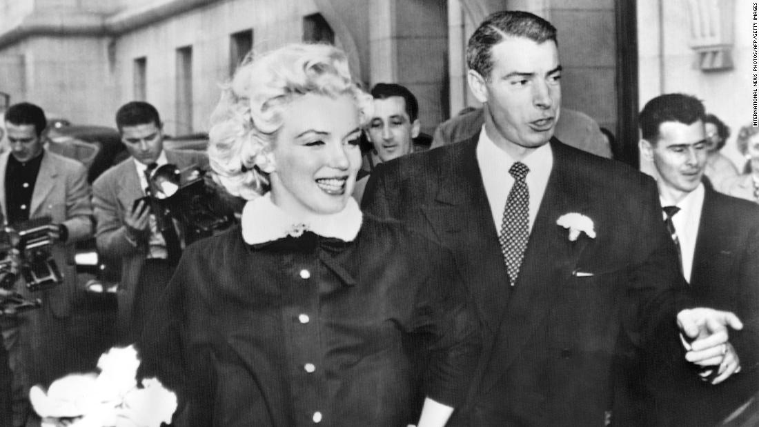 Monroe and former Yankees baseball player Joe DiMaggio leave city hall after their wedding. After two years of dating, their marriage captivated the nation in 1954. &quot;He has a very sensitive nature in many respects. When he was young, he had a very difficult time. So he understood some things about me, and I understood some things about him,&quot; Monroe said. 
