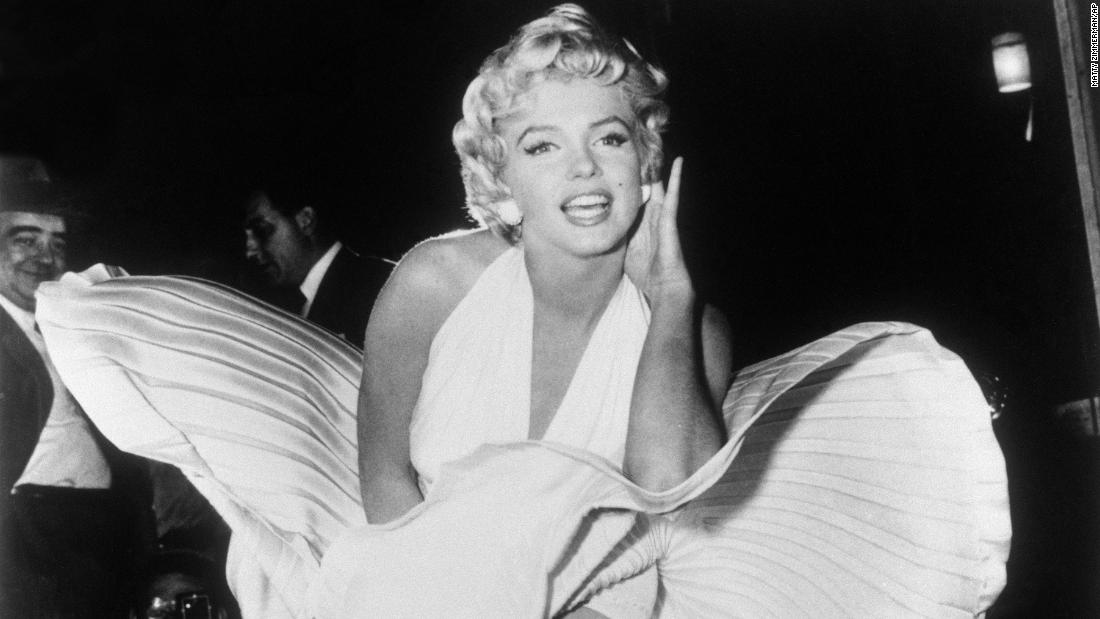 This is &lt;a href=&quot;https://www.cnn.com/style/article/marilyn-monroe-white-dress-remember-when/index.html&quot; target=&quot;_blank&quot;&gt;the most iconic image &lt;/a&gt;of Monroe&#39;s career. While filming for &quot;The Seven Year Itch&quot; in New York, she posed over a subway grate as the breeze sent her dress flying. The crowd shouted &quot;higher&quot; each time a blast of wind lifted her dress. It took 14 takes and the scene was later re-shot at a studio lot in California. &lt;br /&gt;&lt;br /&gt;&quot;We thought it would be over in a minute and a half.  It was two hours of craziness,&quot; said Amy Greene, Monroe&#39;s friend, who was at the New York shoot. 