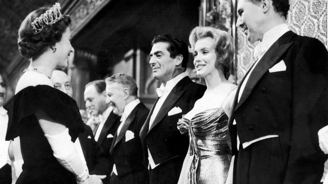 Queen Elizabeth II meets Monroe at the Royal Command Film Performance in London in 1956. Monroe went to England to film &quot;The Prince and the Showgirl&quot; with actor Laurence Olivier.