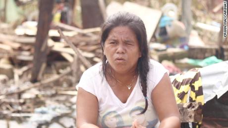 Jovelyn Paloma Sayson&#39;s home collapsed to rubble when Typhoon Rai hit. 