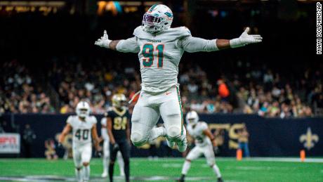 Miami Dolphins defensive end Emmanuel Ogbah (91) celebrates during Monday&#39;s NFL game against the New Orleans Saints, on Dec. 27, 2021, in New Orleans.