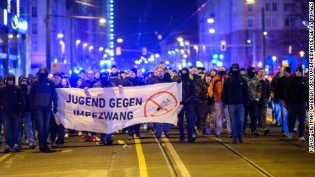 Protests against Germany&#39;s Covid restrictions turn violent as Europe moves to stem Omicron