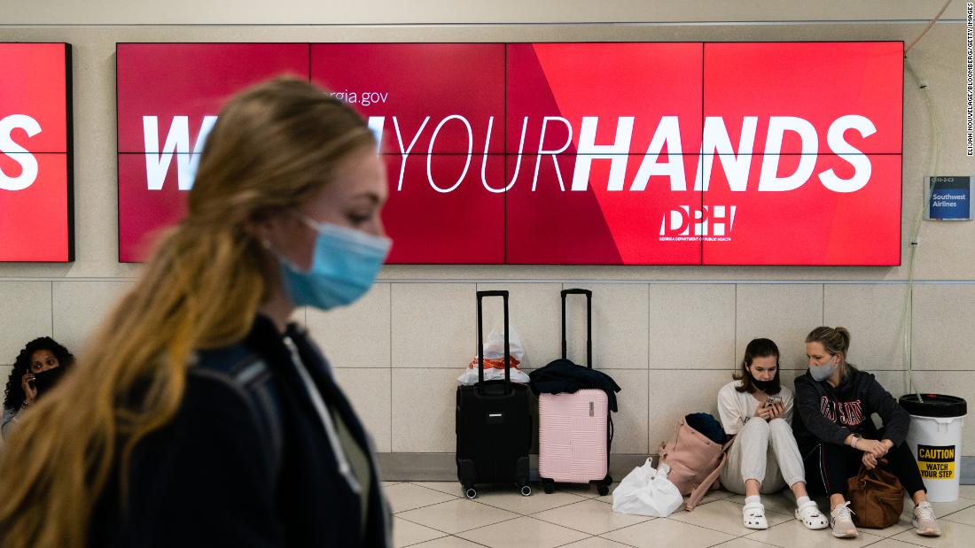 A digital billboard encourages travelers to wash their hands at Atlanta&#39;s international airport on Monday, December 27.