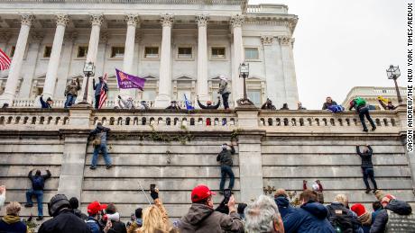 Supporters of President Donald Trump storm the Capitol in Washington on January 6, 2021.