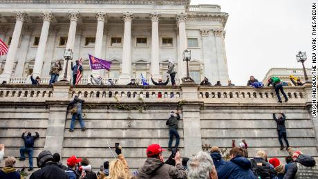 Supporters of President Donald Trump storm the Capitol in Washington on January 6, 2021.